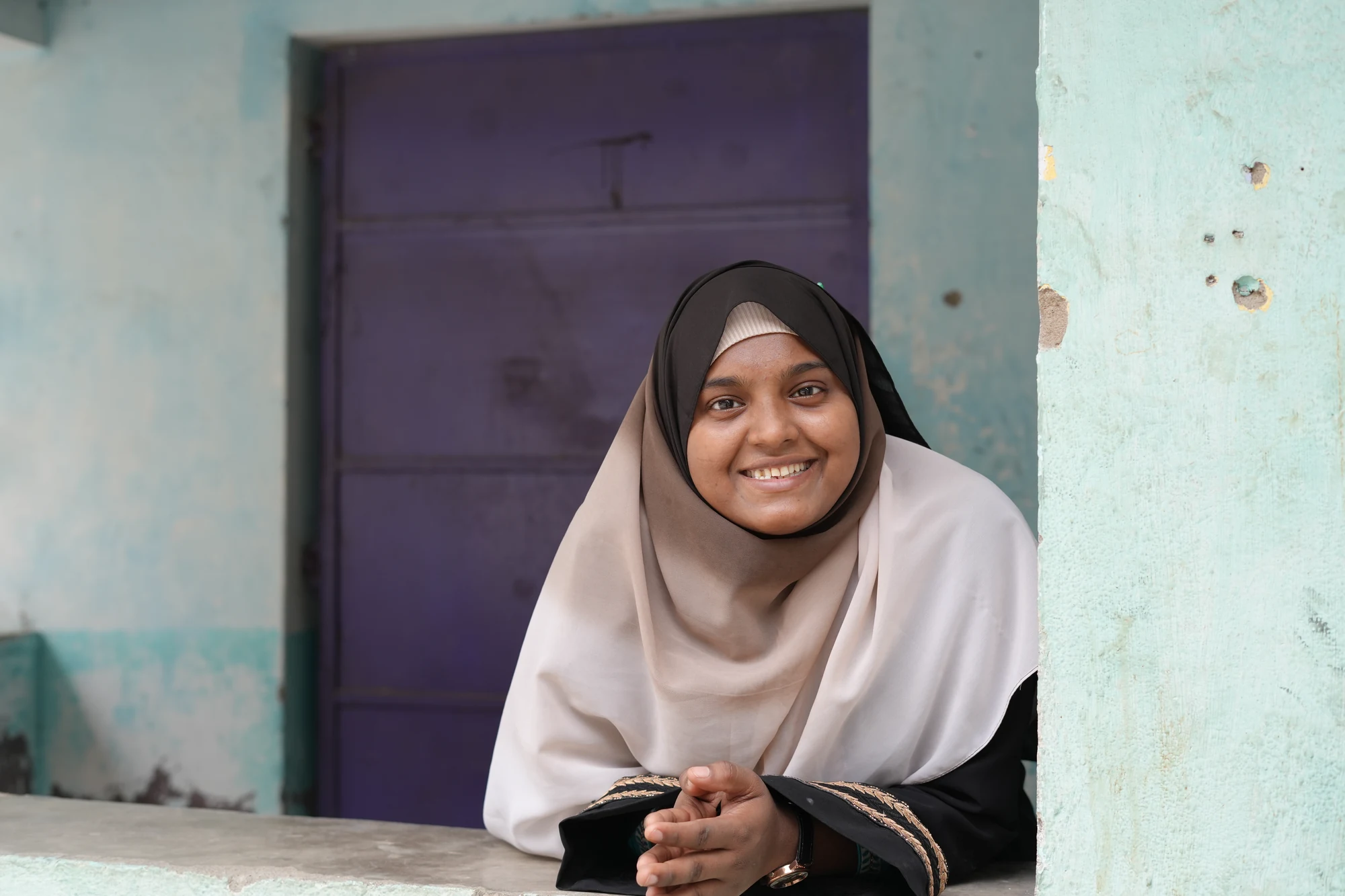 A young woman from a BlueBlots field story